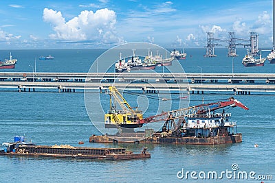 Engineering shipping crane depot at logistic export terminal control. Warehouse freight background container yard loading quayside Stock Photo