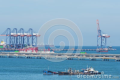 Engineering shipping crane depot at logistic export terminal control. Warehouse freight background container yard loading quayside Stock Photo