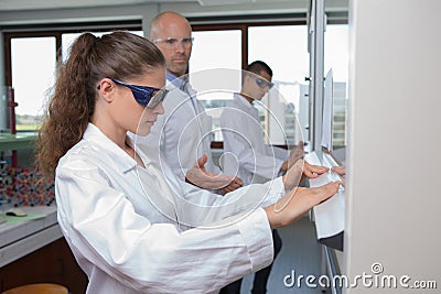 Engineering students working in lab Stock Photo