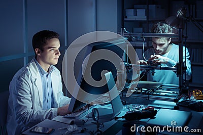 Engineering team working in the lab Stock Photo