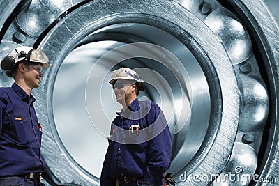 Engineers and ball-bearing industrial Stock Photo