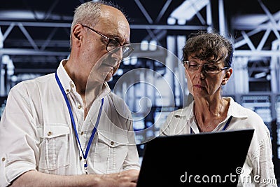 Engineers perform server tests Stock Photo