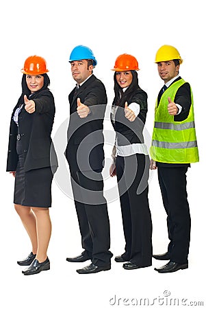 Engineers team giving thumbs Stock Photo