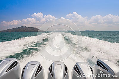 Engines of speed boat are driving along waving of water on ocean Stock Photo