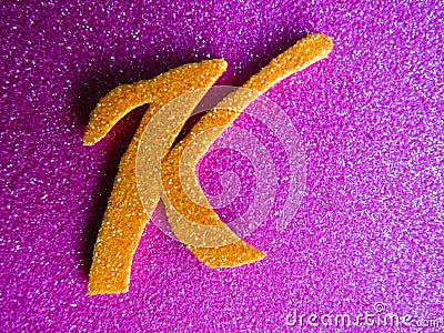 An English alphabet K pink background shiney Stock Photo