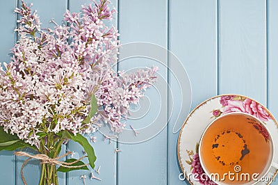 English black tea and blooming lilac Stock Photo