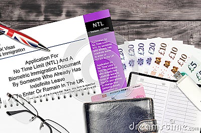 English form NTL Application for No time limit and a biometrical immigration document by someone who already has indefinite leave Editorial Stock Photo