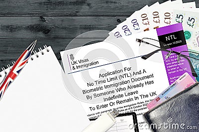 English form NTL Application for No time limit and a biometrical immigration document by someone who already has indefinite leave Editorial Stock Photo