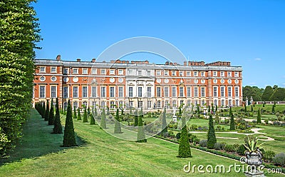 English garden view and the East Front of Hampton court 17th century locates West London Editorial Stock Photo