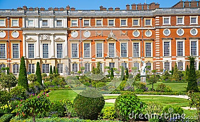 English garden view and the East Front of Hampton court 17th century locates West London Editorial Stock Photo