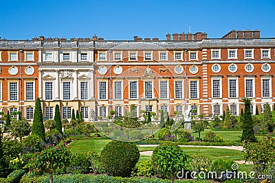 English garden view and the East Front of Hampton court 17th century locates West London Editorial Stock Photo