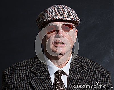 English gentleman in sunglasses and tweeds Stock Photo