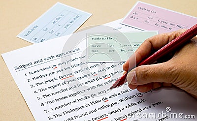 English grammar exercise on table Stock Photo