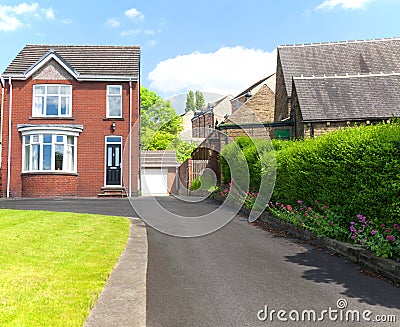 English House. Typical English architecture. House with a driveway Stock Photo