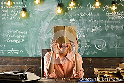 English language learning with vocabulary book. english lesson at school with woman. Stock Photo