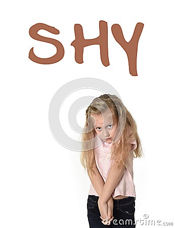 English language vocabulary school card with the word shy and a sweet little girl looking timid Stock Photo