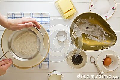 English Scones ingredients, sifting flour Stock Photo