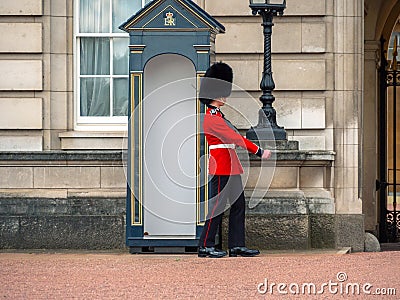 English soldier patrolling at Buckingham Palace Editorial Stock Photo