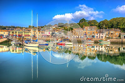 English south west Padstow harbour Cornwall England UK with boats in brilliant colourful HDR Editorial Stock Photo