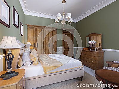English-style bedroom with a large soft fabric bed. bedside tables with lamps. Large wardrobe and dresser with mirror Stock Photo