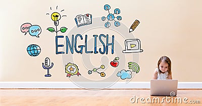 English text with little girl using a laptop computer Stock Photo