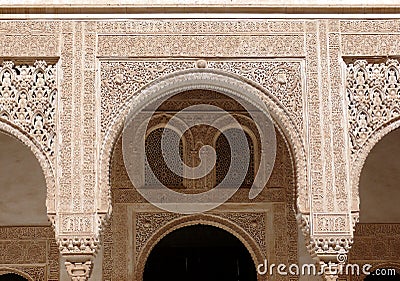 Engraved arches and windows. Islam art. Alhambra Stock Photo
