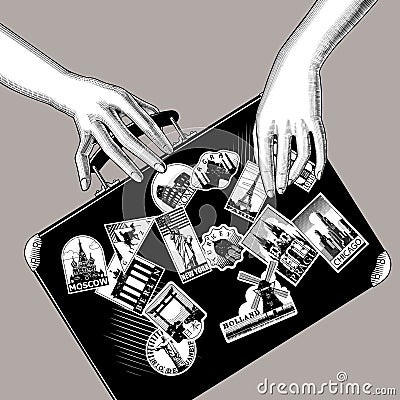 Engraved vintage drawing of female hands stick travel labels on the black suitcase Vector Illustration