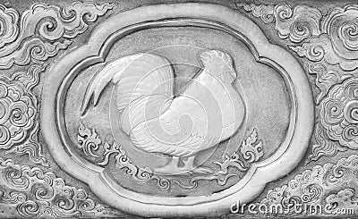 The Engraving of the silver value, Zodiac symbol of thai traditional,cock Stock Photo