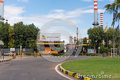 Eni Italy, a chimney of ArcelorMittal formerly Ilva steel industry above the Tamburi district of Taranto, Puglia, Italy Editorial Stock Photo