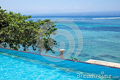 Enjoy the ocean view infinity pool on vacation Stock Photo