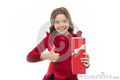 Enjoy receiving presents. Best toys and christmas gifts for kids. Kid little girl in dress curly hairstyle hold gift box Stock Photo