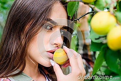 Enjoying eating apricot. natural cosmetics. perfect skin. fashion makeup beauty. juicy fruit. sexy girl. woman near Stock Photo