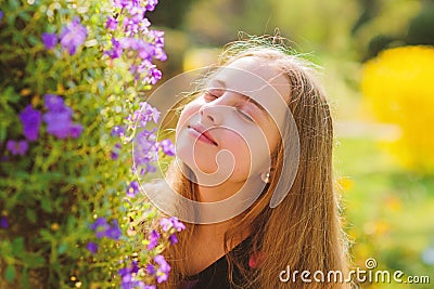 Enjoying nature. Kid cute fancy child spend time in park. Explore garden. Excursion to botanical garden. Spring bloom Stock Photo