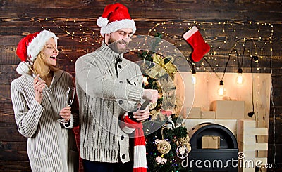 Enjoying nice weekend together. winter season sales. woman and man love xmas gifts. happy new year. family holiday Stock Photo