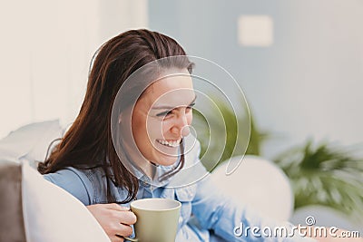 Enjoying sunlight and a hot drink Stock Photo