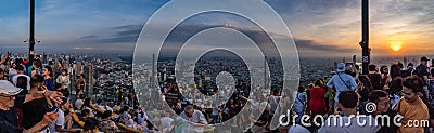 Enjoying sunset on King Power Mahanakhon building rooftop Editorial Stock Photo