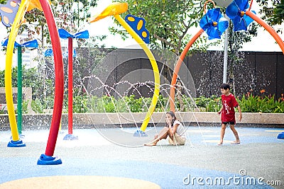 Enjoying the waterpark on a hot day Stock Photo