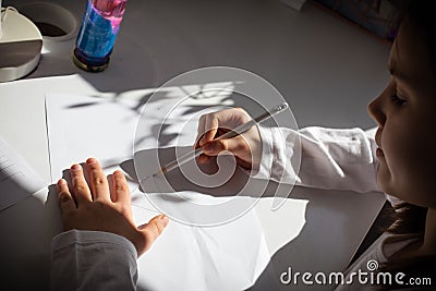 She enjoys every homework Stock Photo