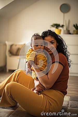 She enjoys every minute spent with her baby Stock Photo