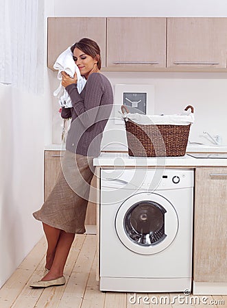 Enjoys a smell of the washed things Stock Photo