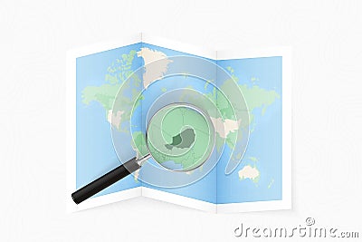 Enlarge Niger with a magnifying glass on a folded map of the world Vector Illustration