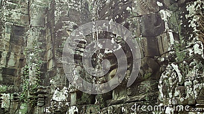 Enorme Steingesichter auf den Wänden eines alten Tempels Kambodscha, Bayon Enorme Steingesichter auf den Wänden eines alten Tempels Kambodscha, Bayon