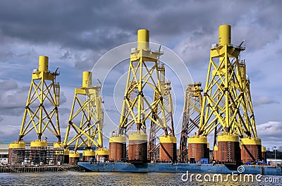 Construction of enormous offshore wind turbine bases Editorial Stock Photo