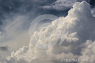 Enormous cloud in the dark blue sky Stock Photo