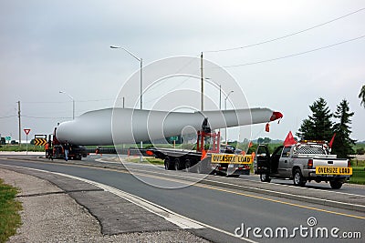 An enormous windmill blade causing a traffic jam Editorial Stock Photo