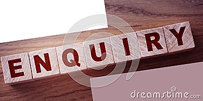 Enquiry word written on wooden blocks on wooden table Stock Photo