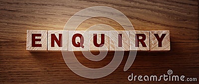 Enquiry word written on wooden blocks on wooden table Stock Photo