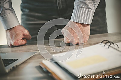 Enraged businessman in office Stock Photo