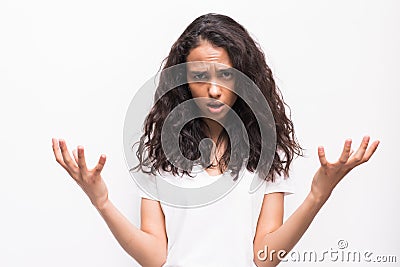 Enraged dissatisfied young female grimacing, clenching teeth and making angry gesture while feeling furious at her cat that broke Stock Photo
