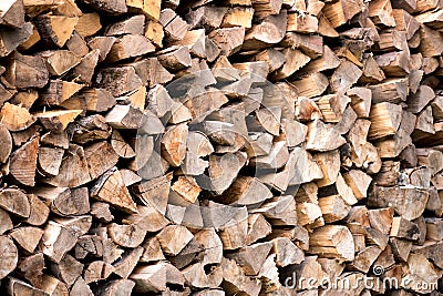 Enregis. Firewood for the fireplace or wood products. Harvesting in the forest by the road. Stock Photo